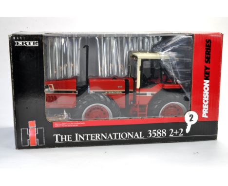 Ertl 1/16 Model Farm Issue comprising Precision Key Series No. 2 International 'Snoopy' 3588 2+2 Tractor. Excellent and not p
