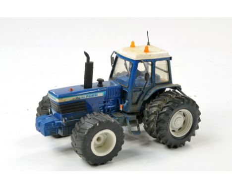 Britains 1/32 Code 3 - Weathered and Modified issue comprising Ford TW30 Tractor. Appears very good to excellent. 