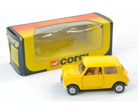 Corgi No. 602 Mini in Yellow, fawn interior. Excellent, no sign of any wear in good to very good box. 