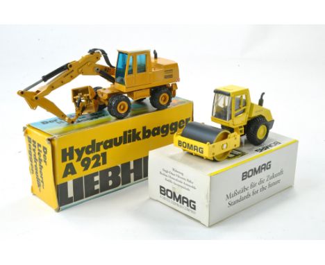 Conrad 1/50 diecast construction issue comprising No. 282 Liebherr A921 Excavator plus Bomag BW213D-3 Roller. Both very good 