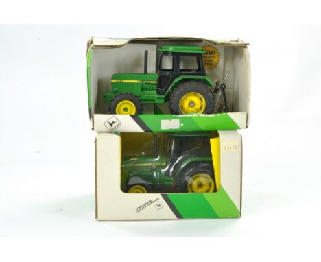 Ertl 1/32 Tractor duo comprising John Deere 3140 plus another with hitch. Good, some wear to one, the other excellent in boxe