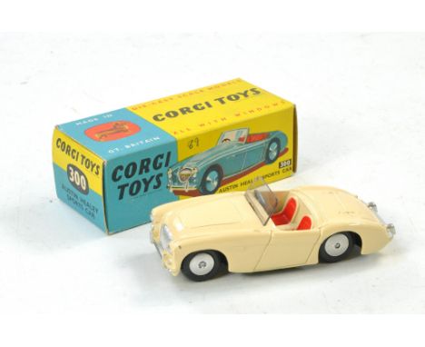 Corgi No. 300 Austin Healey Sports Car. Cream with red seats. Excellent, a single speck of wear in excellent box. 