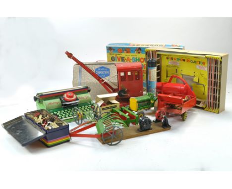 A further selection of interesting old toys and games including Mettoy Tractor Set, Projector Set and other items. All fair o