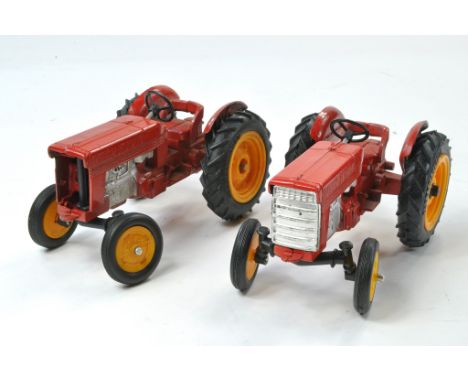 Empire Made duo of International Tractor issues. One is fair with missing parts, the other generally very good. 