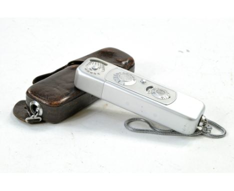 Minox Spy Camera with original leather case and chain. Some wear, still good. 