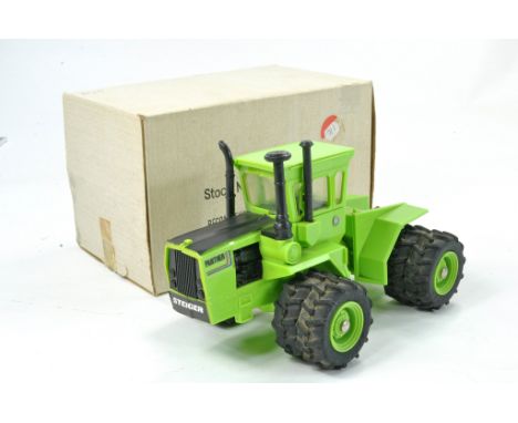 Ertl 1/32 Farm issue comprising Steiger Panther Tractor. Plastic Version. Excellent with original box. 