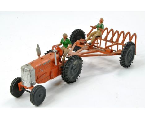Crescent Vintage Tractor and Rake, with two land girl figures. Some obvious age related paint wear throughout but generally g