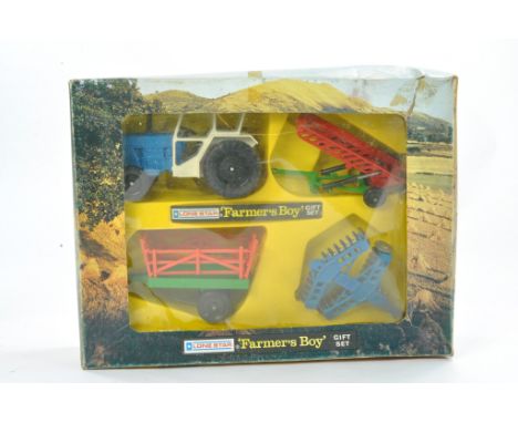 Lone Star Farmer's Boy Series comprising Gift set inc Tractor and trio of implements. Contents excellent, box has storage wea