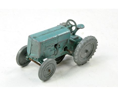 Pure Rubber Products, pre-benbros mechanical tractor based on the Minneapolis Moline variant. In Turquoise. Looks to be compl