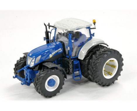 1/32 Farming Models Code 3 issue comprising New Holland T7070 on dual wheels in Ford Tractor livery. Generally excellent, mir
