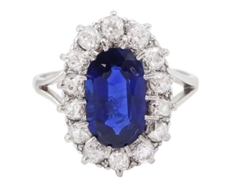 Early - mid 20th century platinum oval cut sapphire and old cut diamond cluster ring, stamped Plat, sapphire approx 1.80 cara