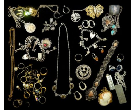 Gold and silver jewellery including two silver charm bracelets, silver stone set jewellery including brooches, necklace, earr