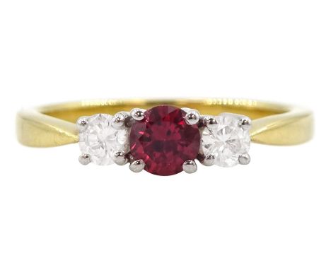 18ct gold three stone ruby and round brilliant cut diamond ring, hallmarked, total diamond weight approx 0.25 caratCondition 