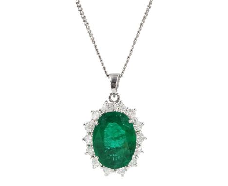 18ct white gold oval emerald and round brilliant cut diamond pendant necklace, emerald approx 3.30 carat, hallmarkedCondition