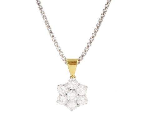 18ct white and yellow gold seven stone round brilliant cut diamond, daisy cluster pendant, on an 18ct white gold chain neckla