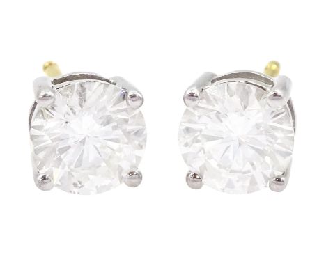 Pair of 18ct white and yellow gold round brilliant cut diamond stud earrings, total diamond weight approx 2.05 carat Conditio