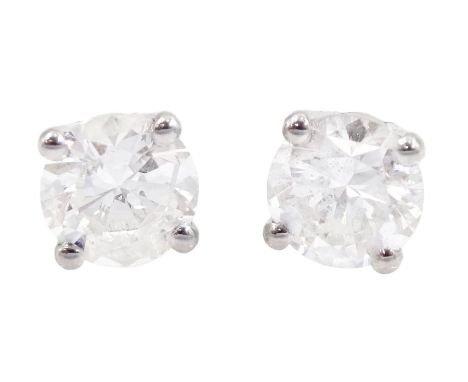 Pair of 18ct white gold round brilliant cut diamond stud earrings, stamped 750, total diamond weight approx 1.05 caratConditi