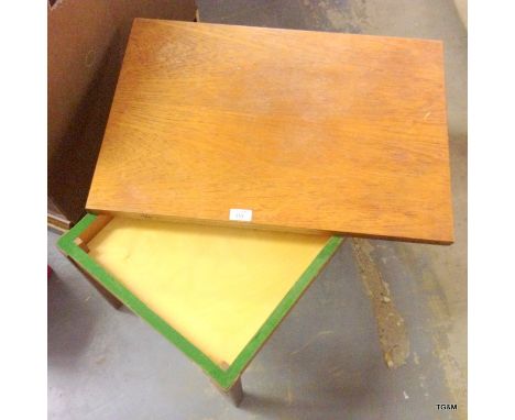 A folding card table