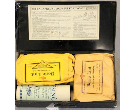 An Air Raid Precautions ARP first aid tin with contents