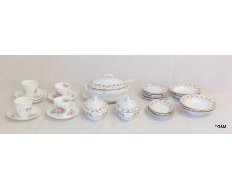 A Coalport set of cups and saucers and a 1920's china dolls dinner service 22 pieces