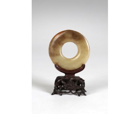 Chinese Art A Pi green jade discChina, Neolithic period. . Cm 5,50.