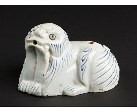 Chinese Art A lion shaped pottery stick holder China, Ming dynasty, 17th century . . Cm 14,00 x 8,00.