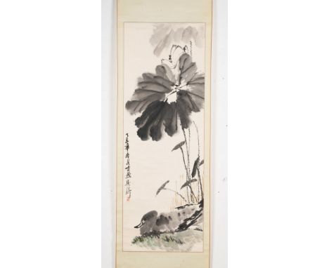 Chinese Art An ink on paper vertical scroll depicting a lotus flowers and a duck. Signed Liang.. . Cm 48,00 x 135,50.