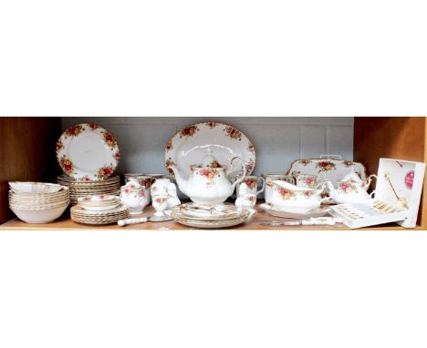 A Royal Albert Old Country Rose Dinner and Tea Service, comprising of a three tier cakestand, bread and butter plate, six mug