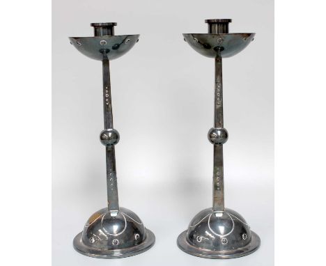 A Pair of German Silver Plate Candlesticks, by Württembergische Metallwarenfabrik (WMF), First Quarter 20th Century, the drip