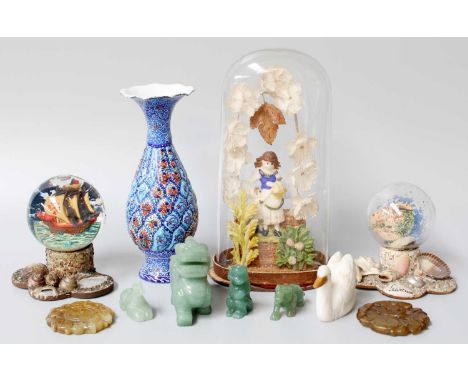 An Early Victorian Figure under a Glass Dome, together with two Victorian snow globes, a collection of hardstone figures, and