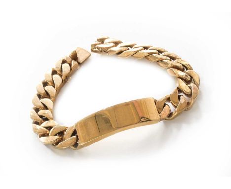 A 9 Carat Gold Identity Bracelet, length 21.2cmThe bracelet is in fair condition with scuffing throughout commensurate with u
