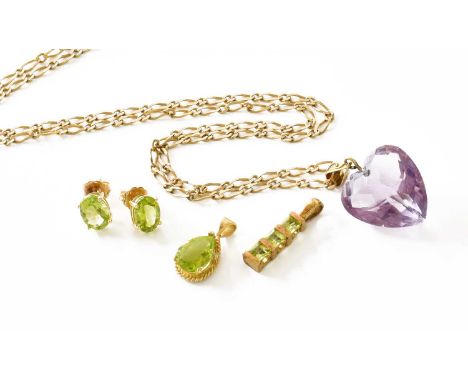 An Amethyst Pendant, the heart shaped amethyst on suspension loop stamped '14K', measures 2.8cm by 1.8cm; A 9 Carat Gold Fanc