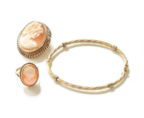 A 9 Carat Gold Cameo Ring, finger size M; A Hinged Bangle, stamped '375', inner measurements 6.2cm by 5cm; and A Cameo Brooch