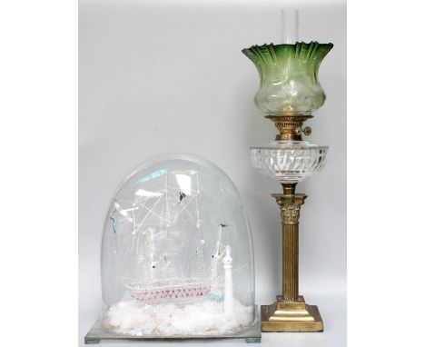 A Victorian Glass Frigger of a Triple Masted Ship, by a lighthouse with two sloops, 41cm high together a brass Corinthean col
