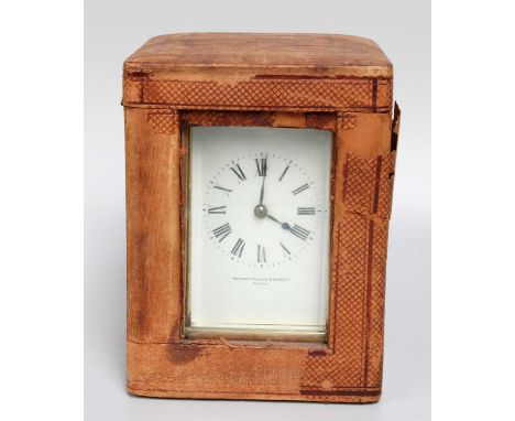 A Brass Striking Carriage Clock, circa 1900, retailed by Manoah Rhodes &amp; Sons Ltd. Paris, with fitted case, 17cm high ove