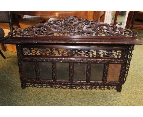 Chinese Republic Hardwood carved over mantel of single shelf over 6 glazed panels, decorated with surmounted Dragon and prunu