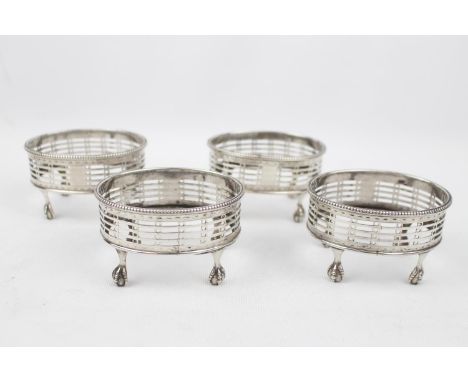 A set of four Silver George III oval salts with pierced sides and claw feet - 3.5" long - London 1779 by R HENNELL - 251g tot