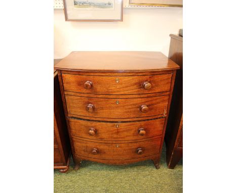 19thC Mahogany commode in the form of a chest of 4 drawers with turned wooden handles 