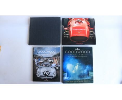 Four hardback books to include a limited edition copy of Fangio-A Pirelli Album by Stirling Moss (250/500 and signed in pen b