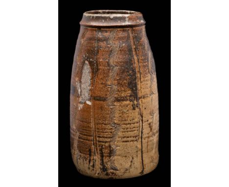 * Bernard Leach [1887-1979] a stoneware vase: of tapering cylindrical form with incised and combed vertical decoration under 