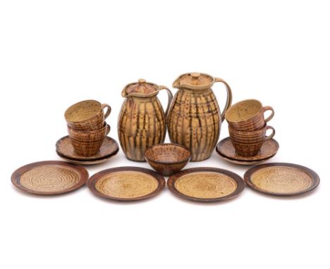 *Michael Leach [1913-1985] a stoneware part service: comprising four cups, four saucers, four plates, sugar bowl and two coff