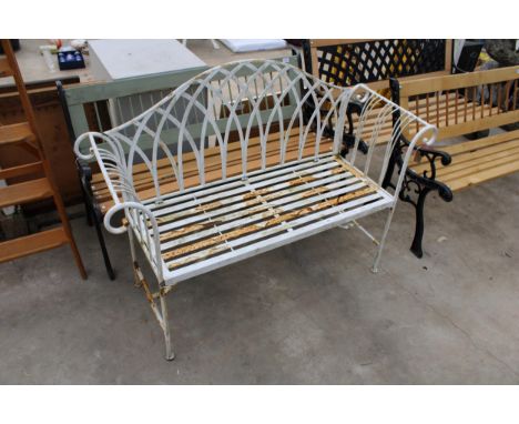A DECORATIVE METAL TWO SEATER GARDEN BENCH 