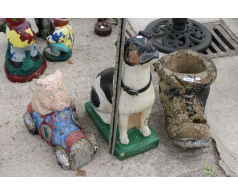 THREE CONCRETE GARDEN ITEMS TO INCLUDE A BOOT PLANTER, A DOG AND A PIG ETC 