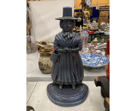 A VERY HEAVY VINTAGE WELSH LADY CAST DOOR STOP, HEIGHT 37CM 