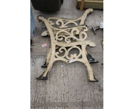 A PAIR OF DECORATIVE CAST BENCH ENDS 
