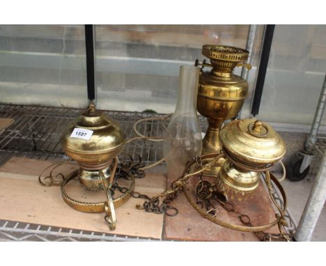 A VINTAGE BRASS OIL LAMP CONVERTED TO ELECTRIC AND TWO BRASS CEILING LIGHTS 