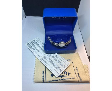 A SILVER ROTARY WRIST WATCH IN A PRESENTATION BOX 