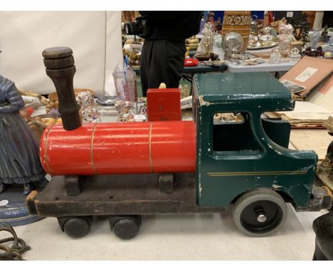 A CHILD'S VINTAGE WOODEN SIT ON CHOO-CHOO 