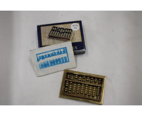 A SMALL VINTAGE HEAVY BRASS ABACUS 