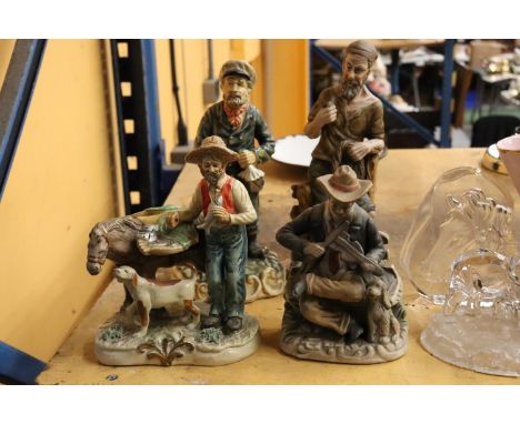FOUR VINTAGE CHALKWARE FIGURES OF OLD MEN 